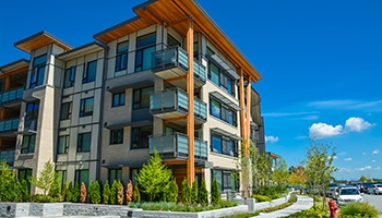 a suburban apartment building during the day