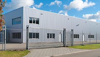 the exterior of a modern warehouse building