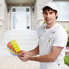 Painter displaying paint color samples