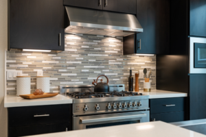 a modern kitchen with stainless steel appliances